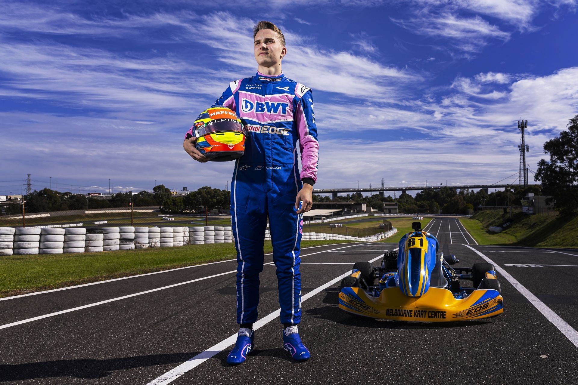 Oscar Piastri poses in Alpine overalls in April 2022 - Source: Getty